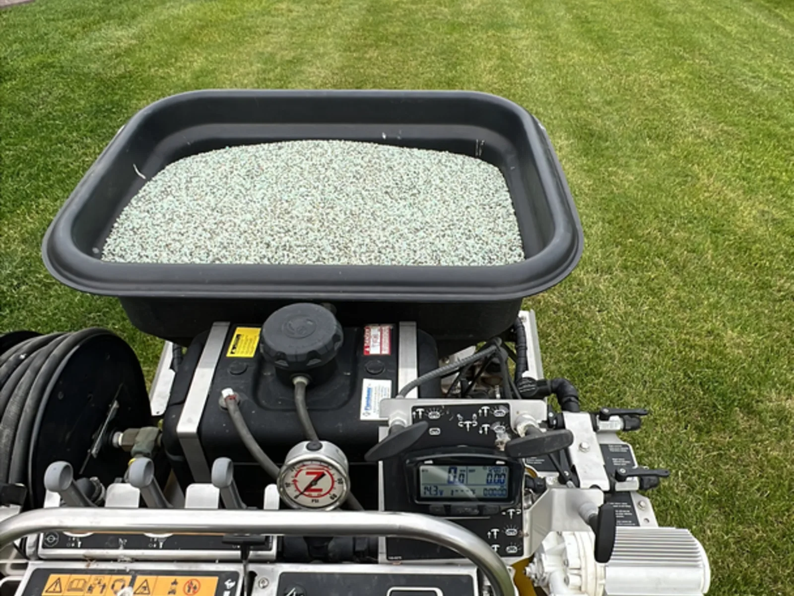 Commercial zero turn mower working a lawn care route near Fort Wayne, Indiana
